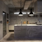 cuisine-en-beton-avec-suspensions-noirs