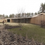 Maison avec pergolas en bois