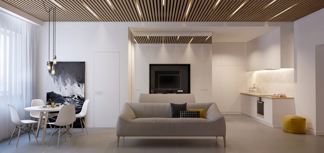 Appartement minimaliste de 50 m² avec canapé gris et décoration intérieure épurée