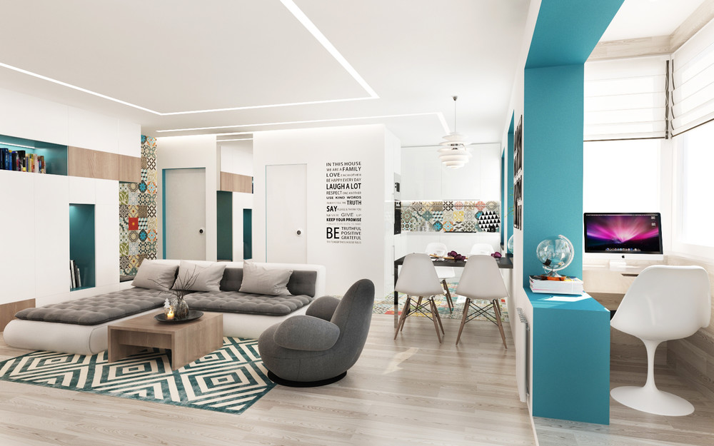Décoration design épurée dans un appartement de 50 m² avec salon ouvert et touches turquoise