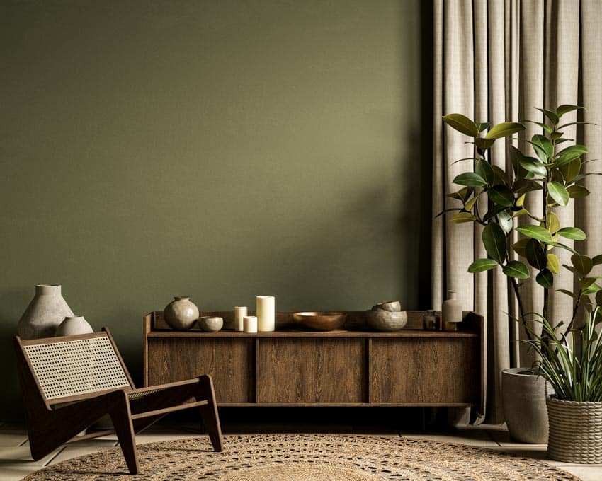 murs vert olive et meuble en bois rustique